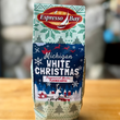 Load image into Gallery viewer, Espresso Bay Michigan White Christmas coffee package on a wooden surface with a blurred background
